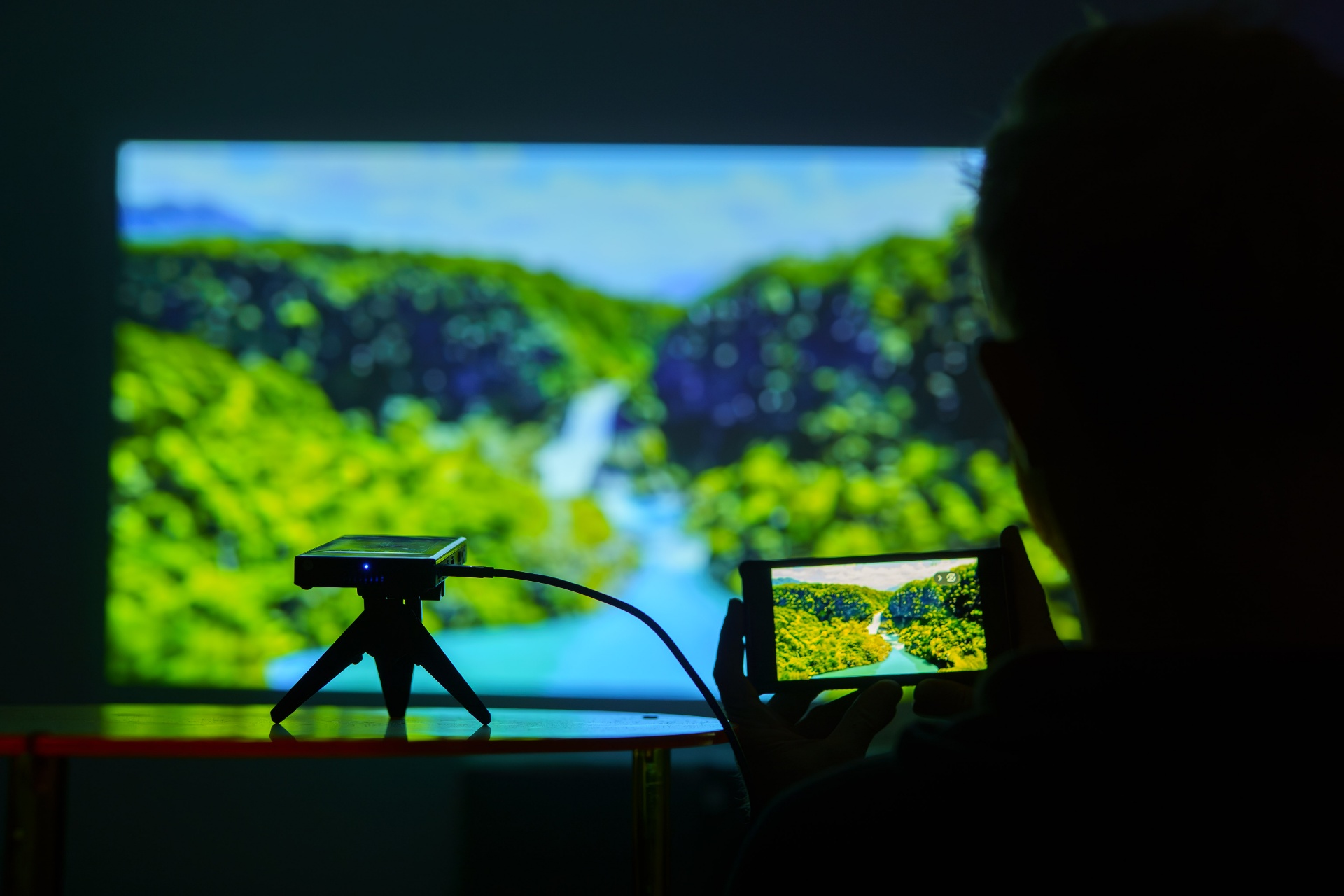 People Using Mini Projector Portable Mini Projector | Big Screen. Small Package.